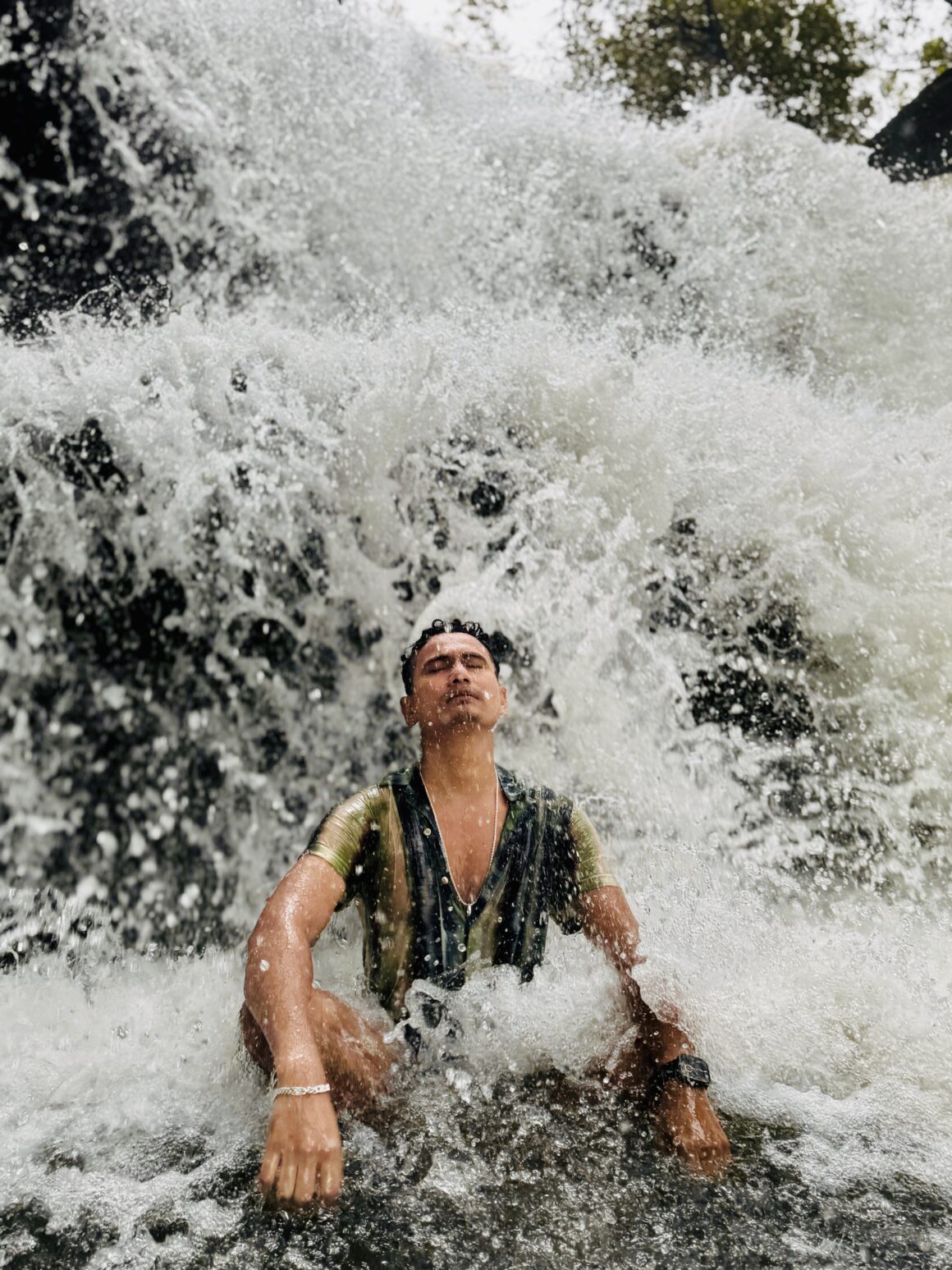 Get shower at  Kbal Chhay Waterfall, Cambodia